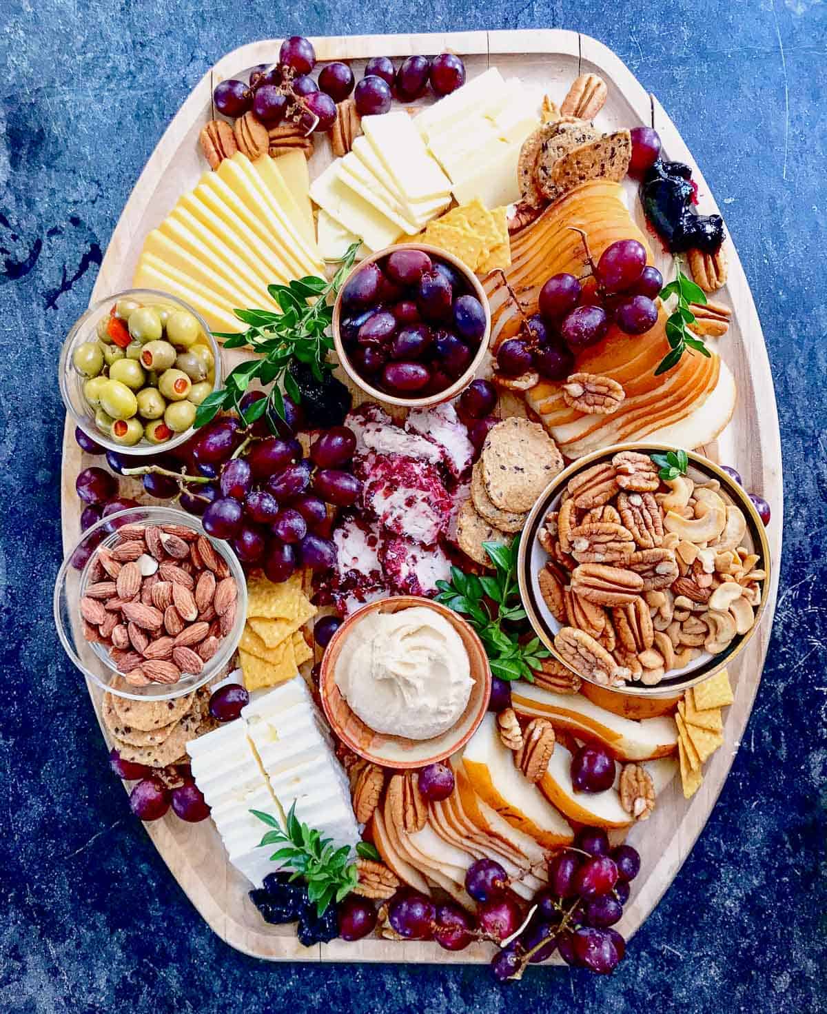 close up of a charcuterie board with bowls