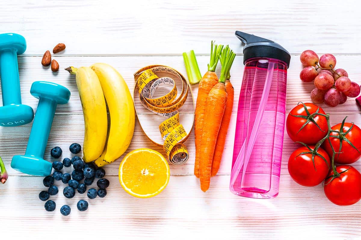 colorful vegetables and exercise equipment