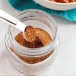 chili seasoning mix in glass jar with spoon
