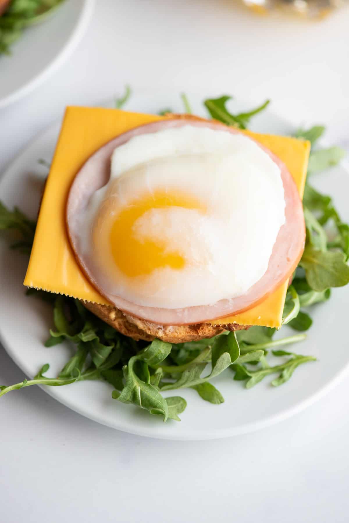 air fryer poached eggs on breakfast sandwich