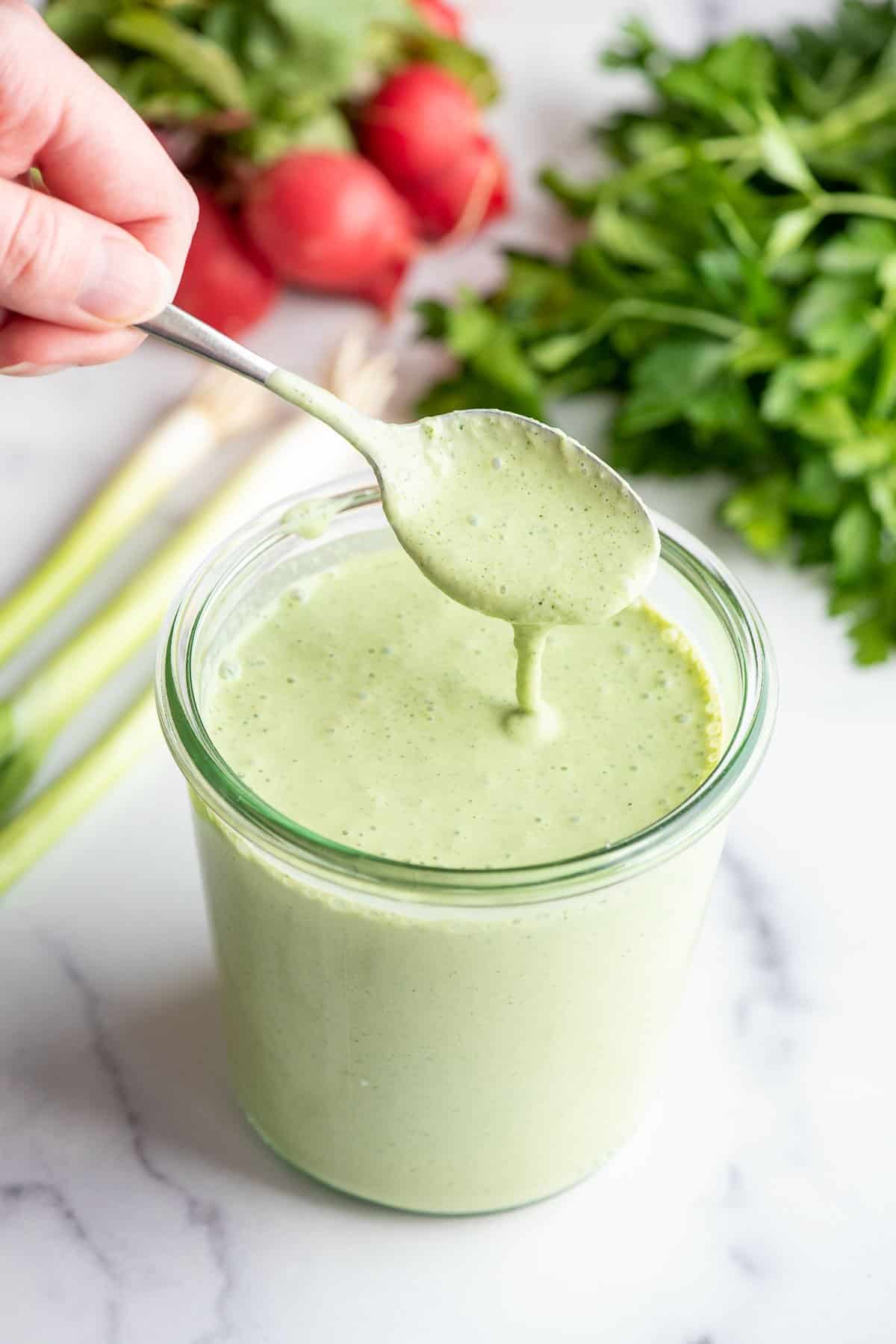 green goddess dressing with spoon