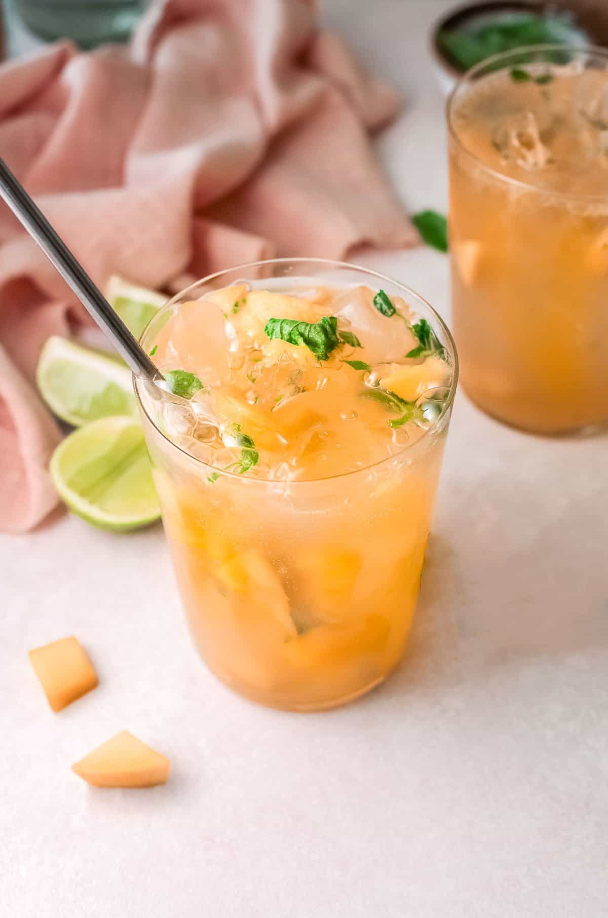 skinny mango margarita with metal straw