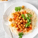 instant pot chana masala on white plate with rice