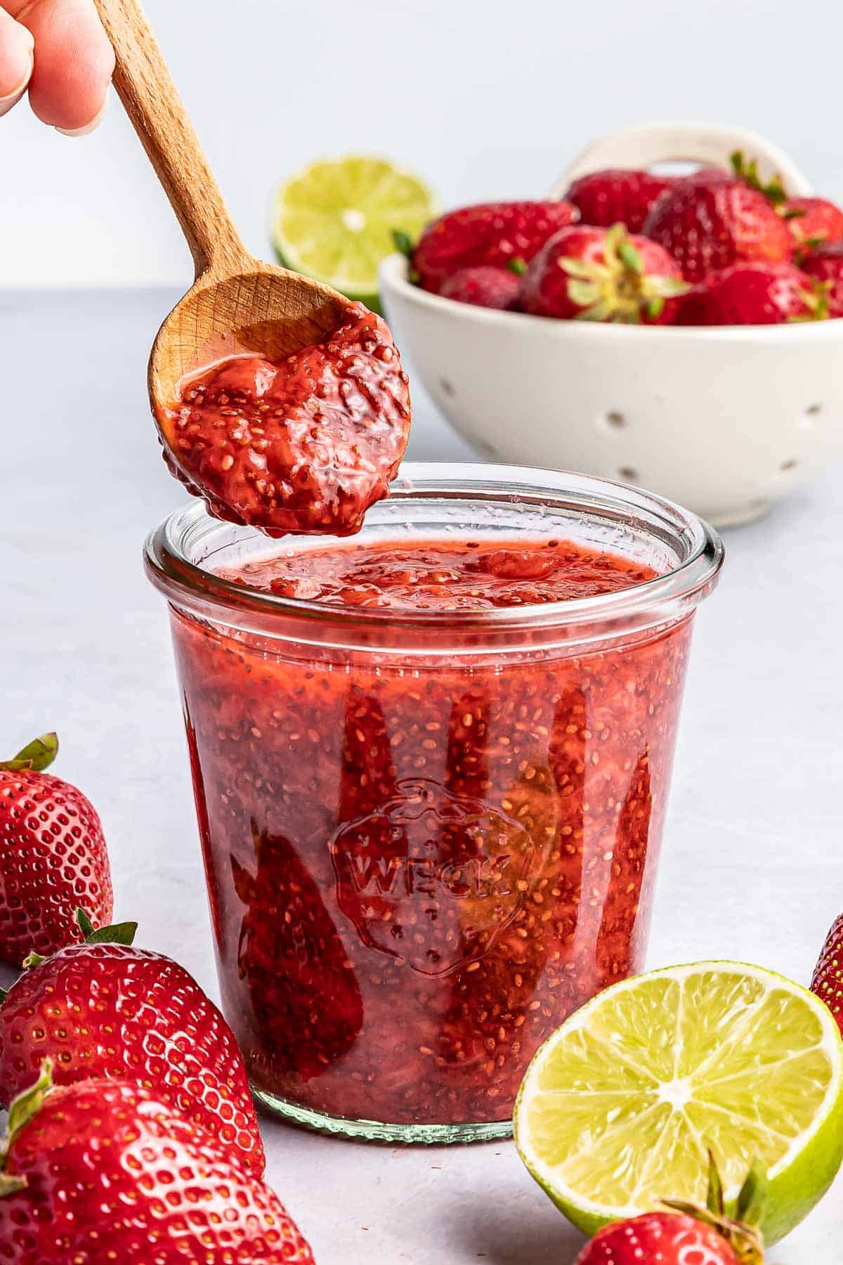 low sugar strawberry jam in jar with spoon