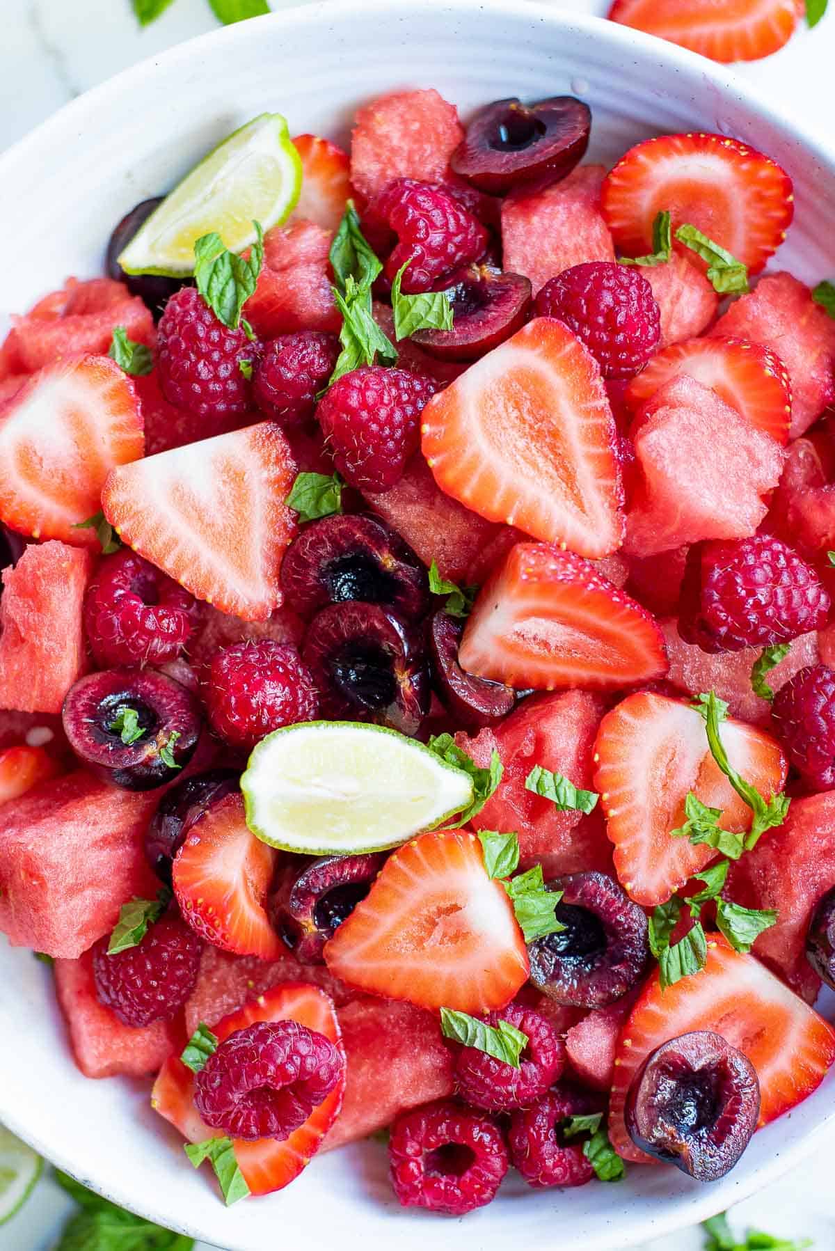 summer fruit salad in a bowl overhead