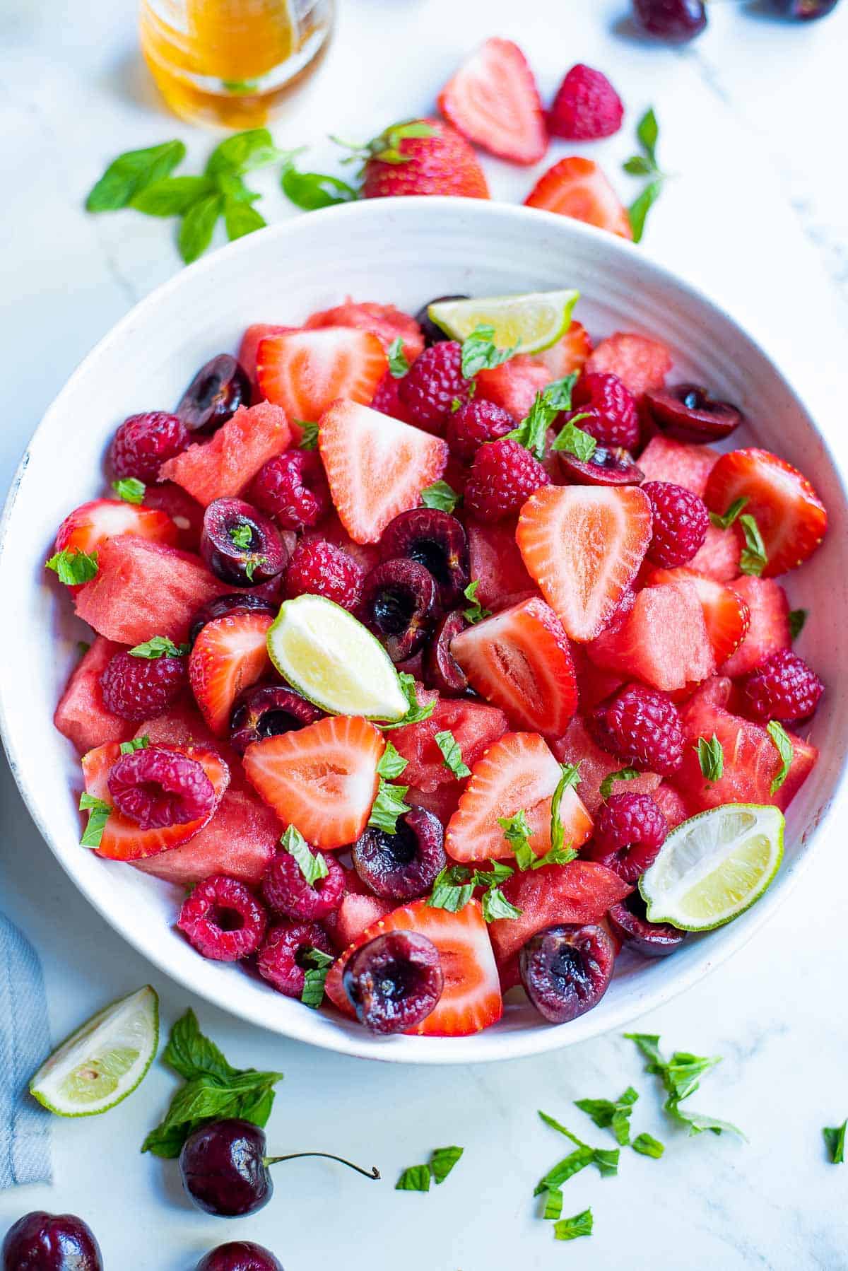 summer fruit salad in a serving bowl