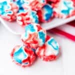 red white and blue meringue cookies with pop rocks close up.