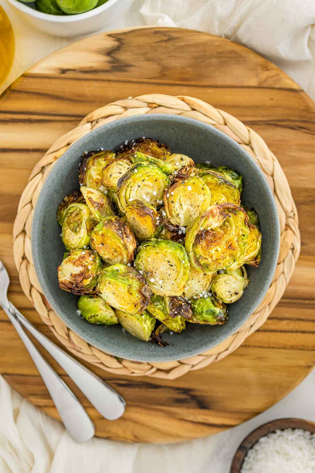 air fryer brussels sprouts in a bowl overhead.