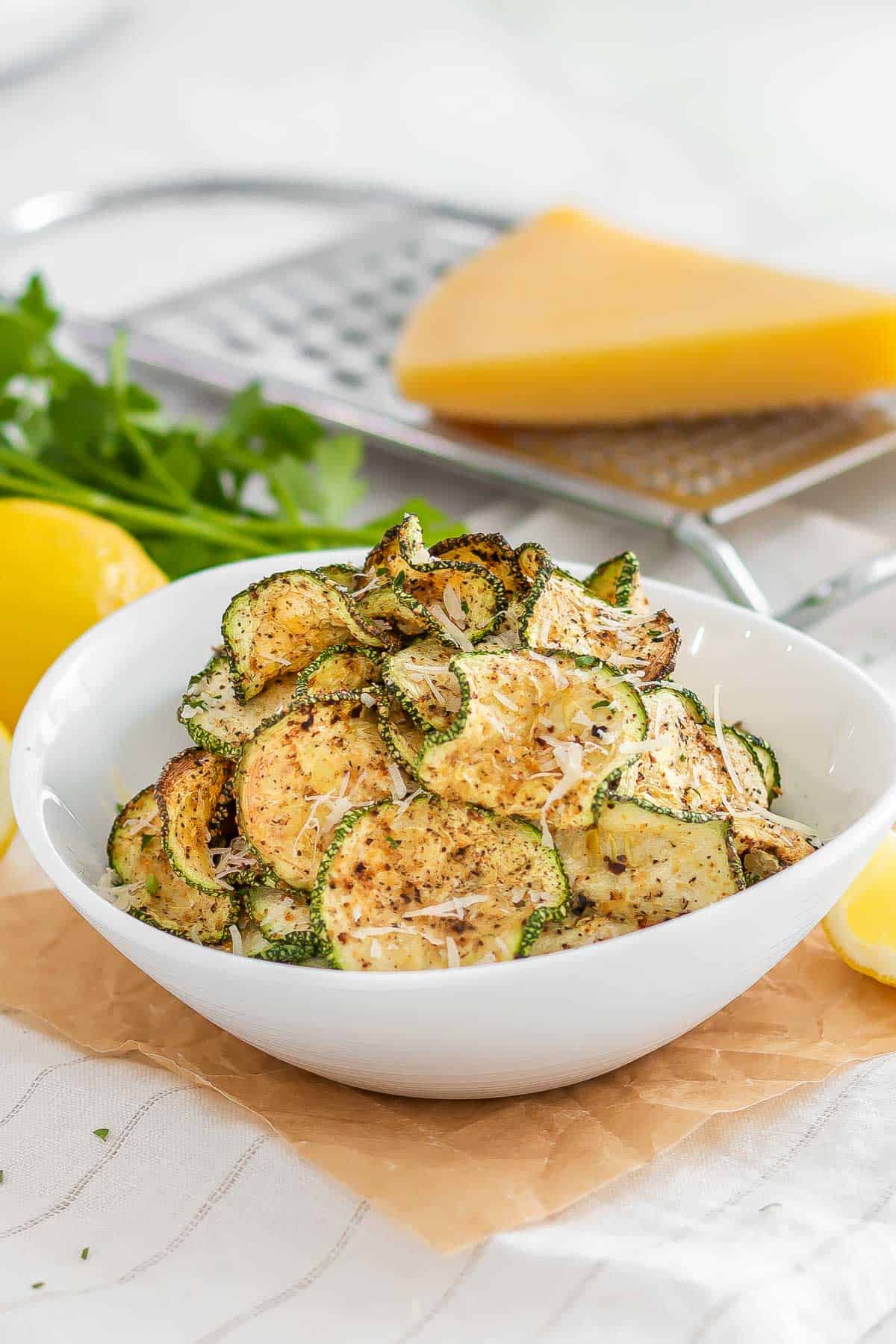 air fryer zucchini chips in a bowl.