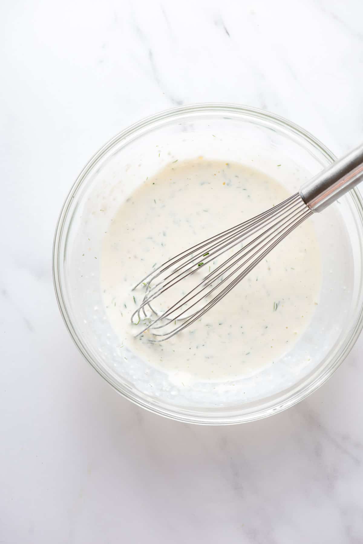 low calorie ranch dressing ingredients in a mixing bowl whisked