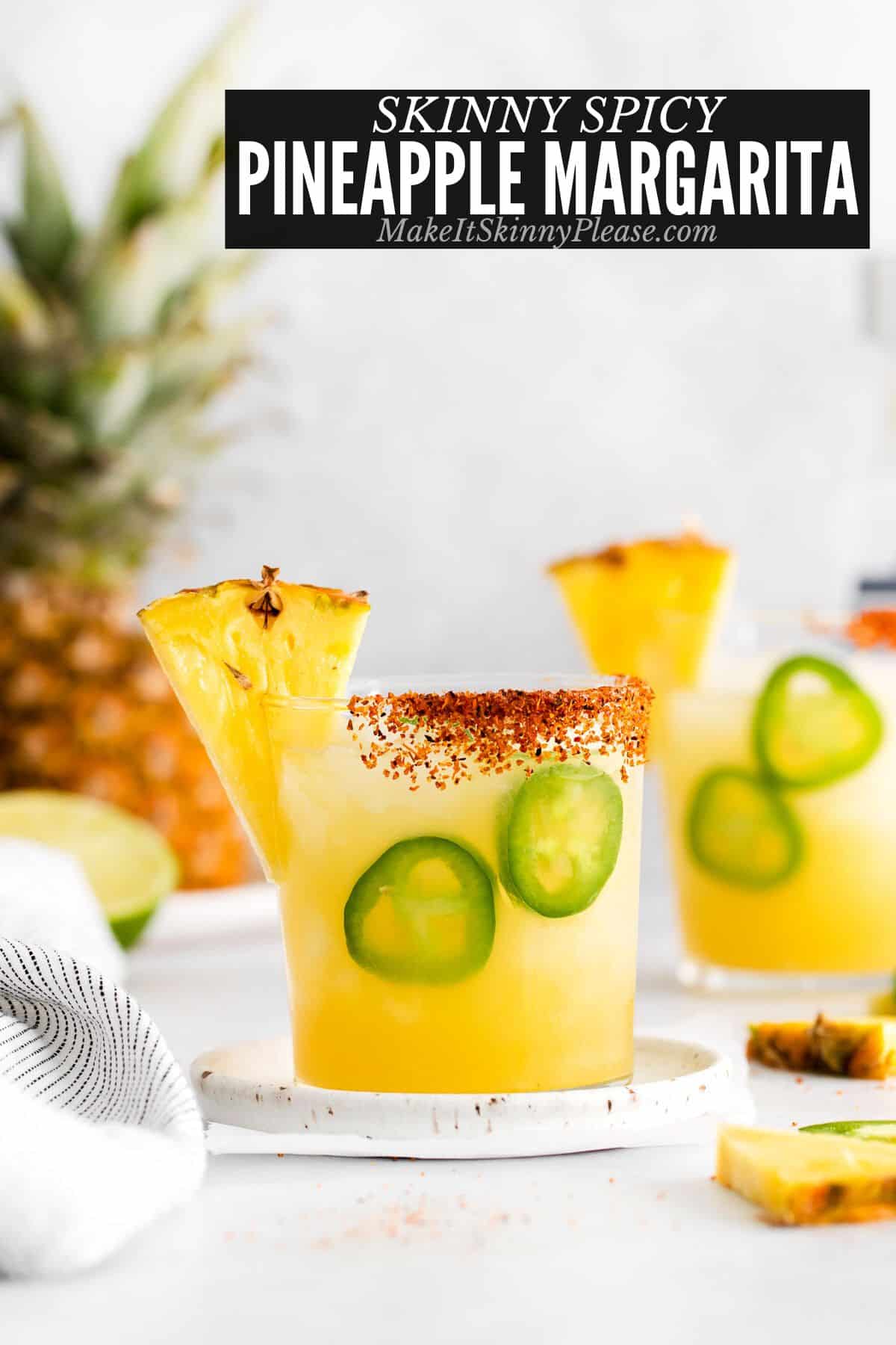 skinny spicy pineapple margaritas with rimmed glass.
