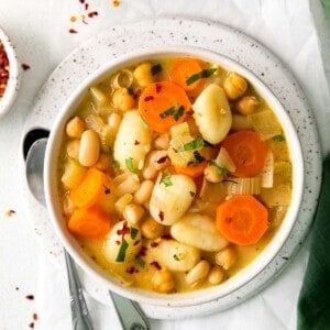 vegetable gnocchi soup in bowl overhead.