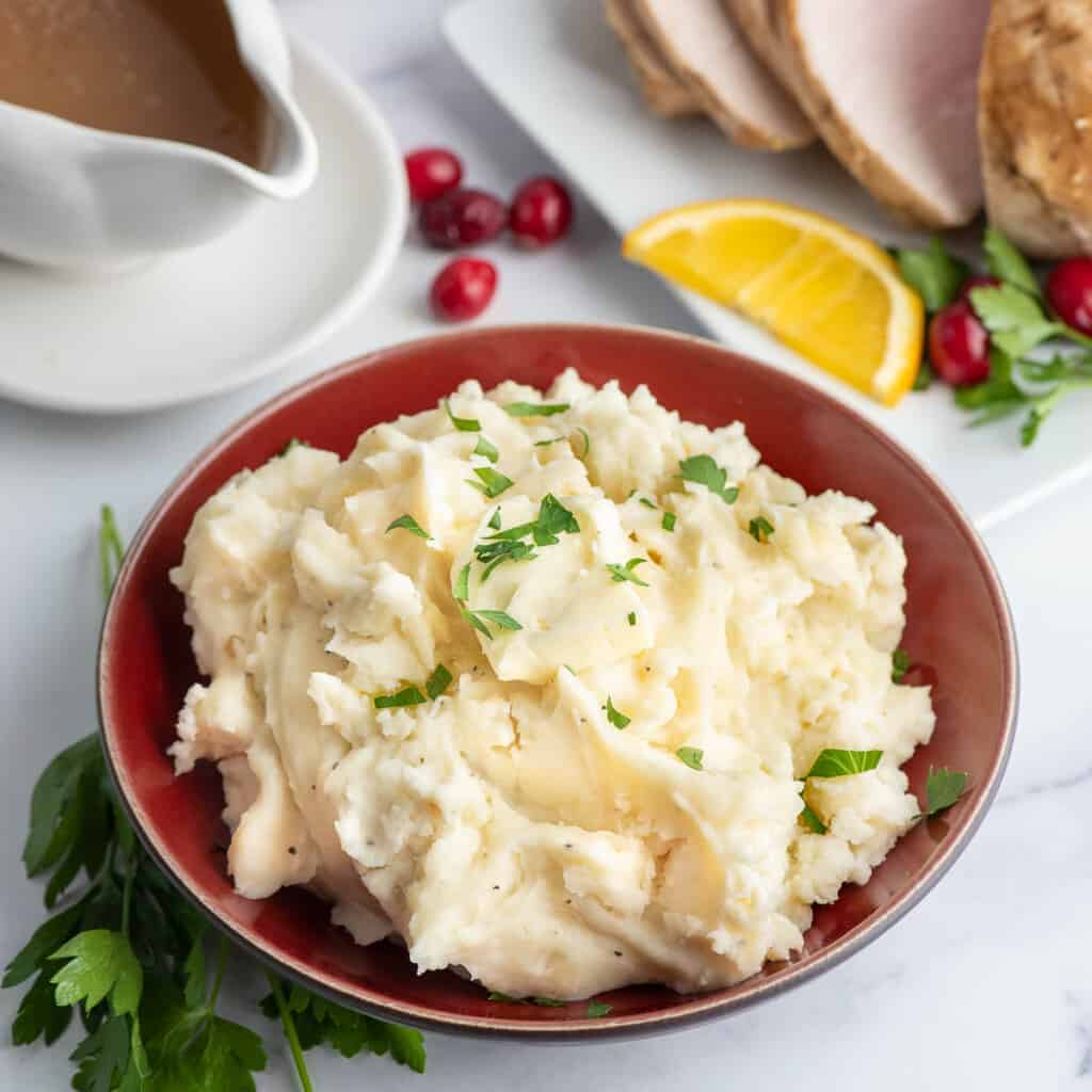 cauliflower mashed potatoes with thanksgiving foods.