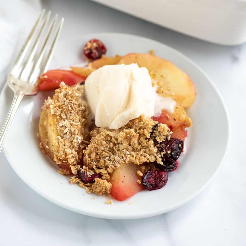 apple cranberry crisp serving close up.