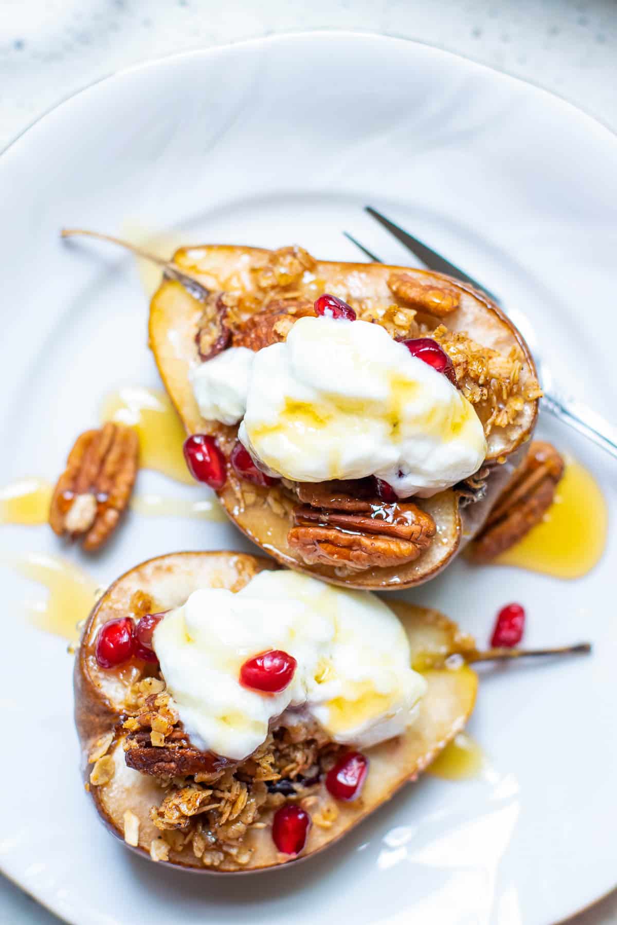 baked pears on a plate.