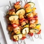 cooked air fryer chicken kabobs on plate