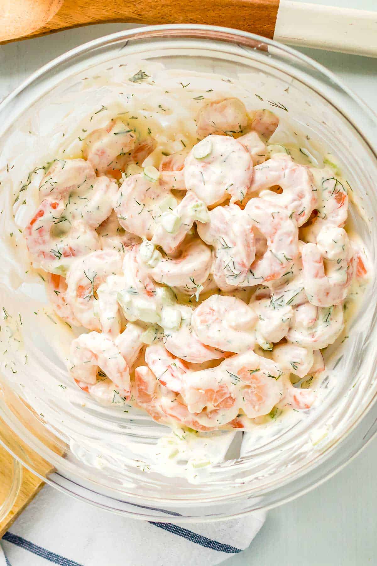 shrimp salad ingredients mixed together.