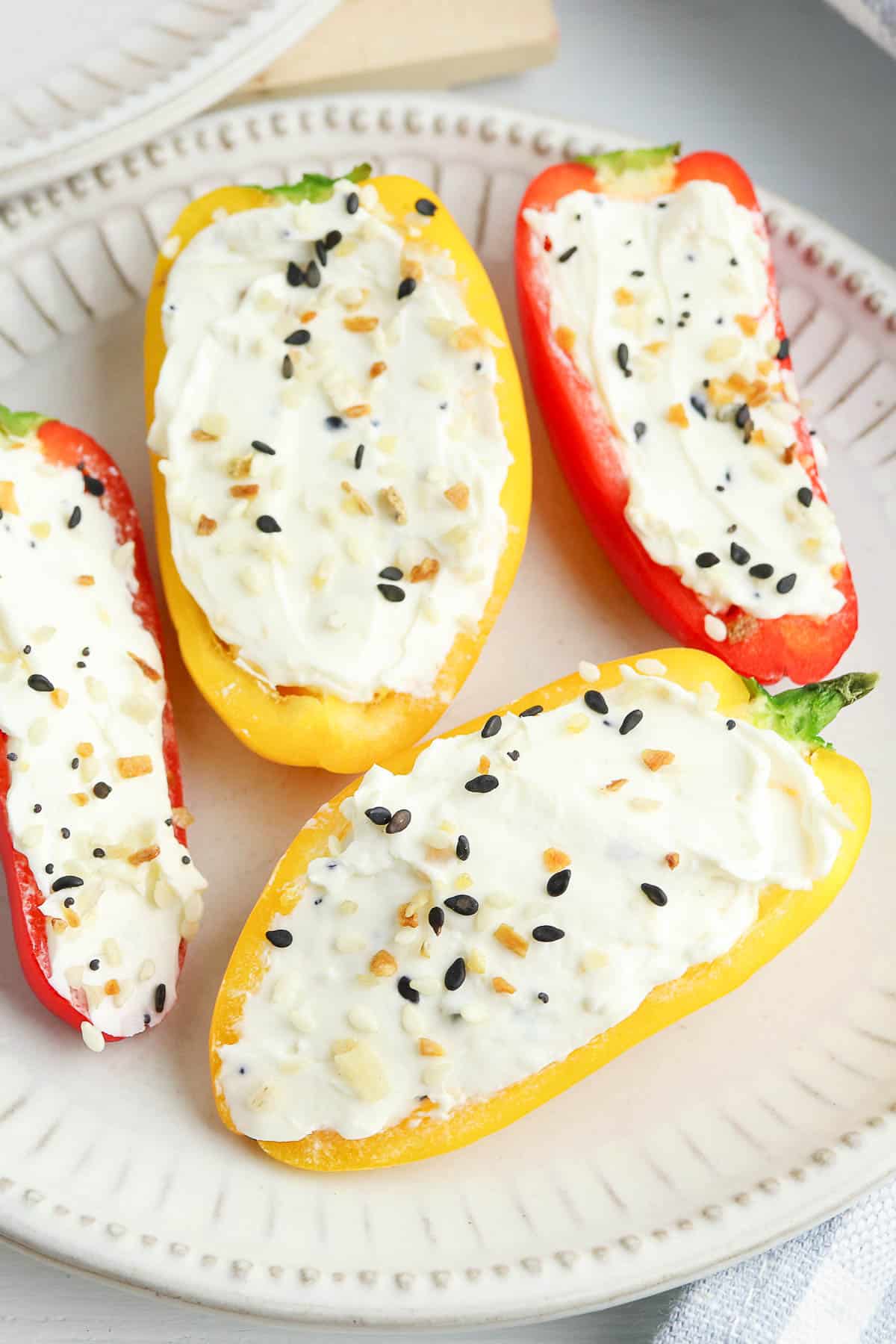 cream cheese stuffed peppers close up on plate.