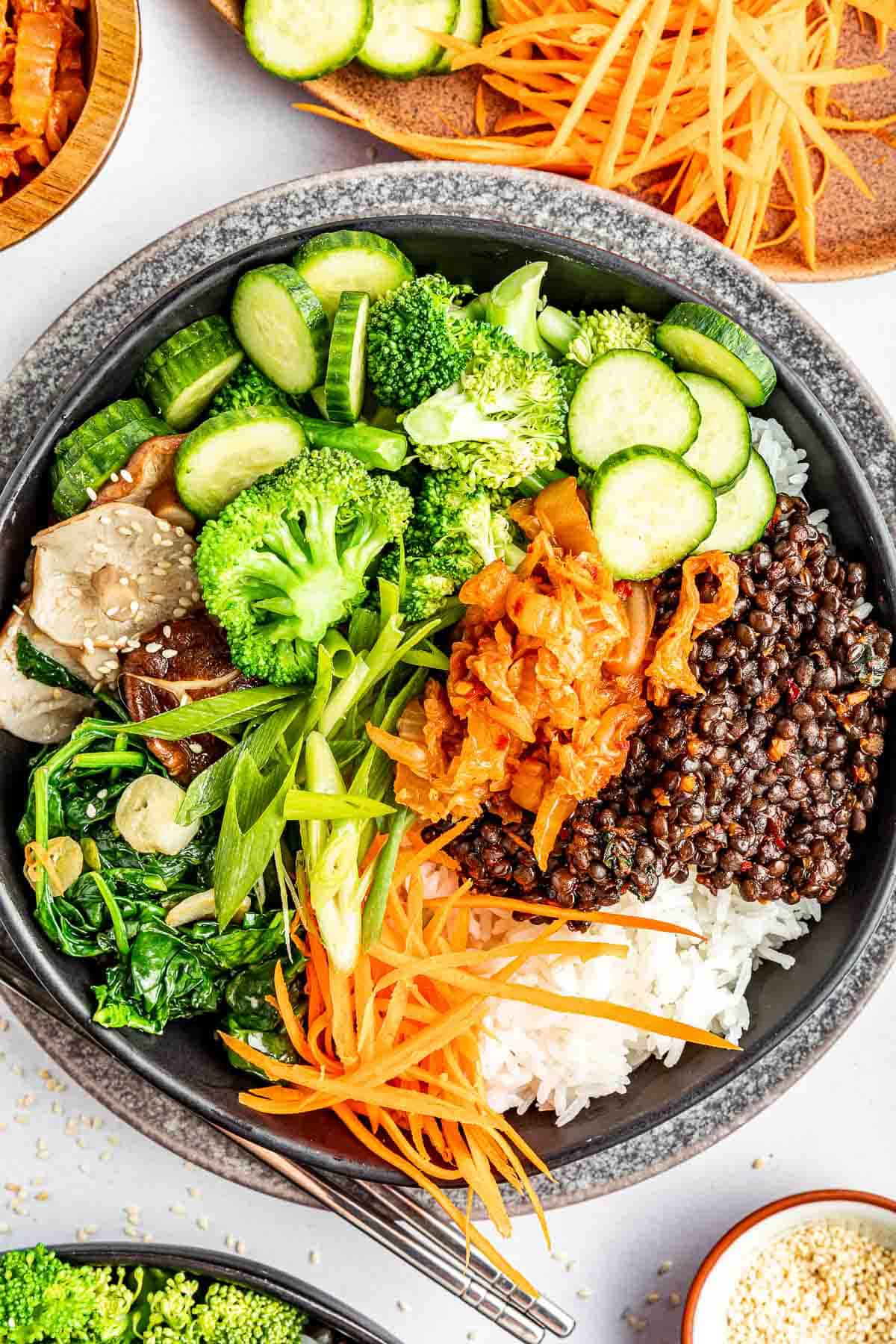 buddha bowl recipe with black lentils from above close up.