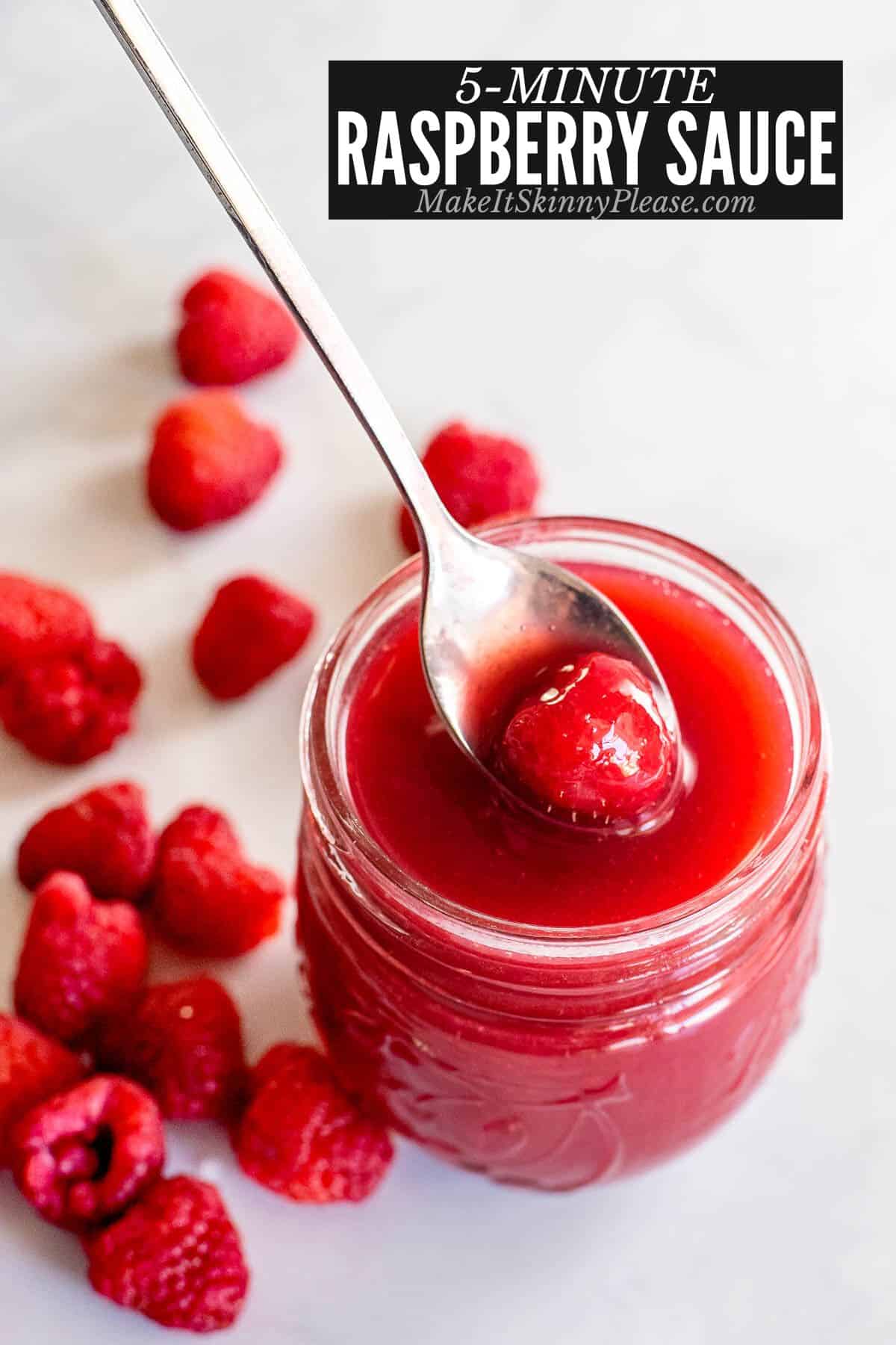 raspberry sauce in a glass jar with spoon.