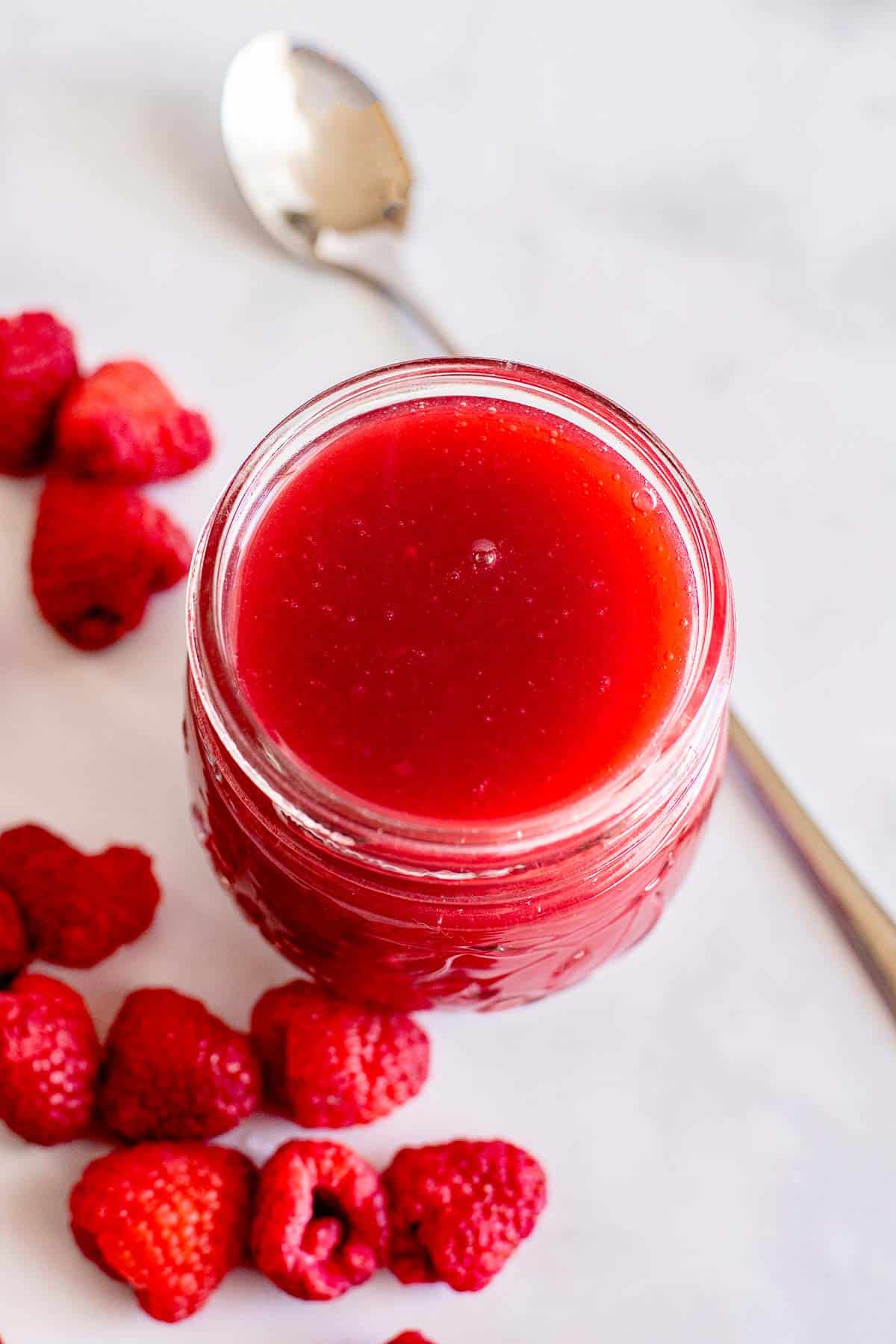 raspberry sauce in jar.